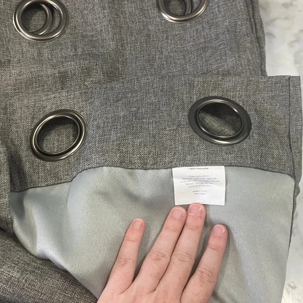 Set of 2 Grey window Curtains about 3ft by 7 ft with grommets.  rod hanging